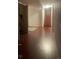 Finished basement with stairs, wood flooring and a checkers game at 1515 S Monaco Pkwy, Denver, CO 80224