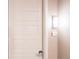 Private apartment entrance with keyless entry and modern door design at 12983 W Ida Ave # 306, Littleton, CO 80127