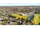 Aerial view of home near school and park, showcasing surrounding neighborhood at 112 W Elm St, Louisville, CO 80027