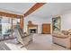 Bright living room with fireplace and access to backyard at 112 W Elm St, Louisville, CO 80027