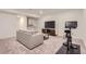 Finished basement with a sitting area and exercise equipment at 5980 Sima Cir, Lone Tree, CO 80124