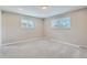 Spacious bedroom with neutral carpeting and large windows at 9014 W Harvard Dr, Lakewood, CO 80227