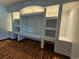 Built-in entertainment center with recessed lighting and shelving at 1883 S Pierce St, Lakewood, CO 80232