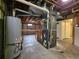 Unfinished basement with HVAC and water heater at 1883 S Pierce St, Lakewood, CO 80232