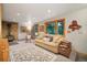 Cozy basement Gathering room with wood stove and access to backyard at 6763 Deer Path, Evergreen, CO 80439