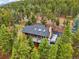 House with large deck and mountain views at 6763 Deer Path, Evergreen, CO 80439