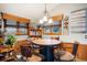 Cozy dining area with rustic table and chairs at 6763 Deer Path, Evergreen, CO 80439