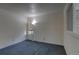 Bright bedroom with neutral carpeting and a window with blinds at 1050 S Monaco Pkwy # 88, Denver, CO 80224