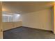 Spacious bedroom with carpeted floors and a window at 1050 S Monaco Pkwy # 88, Denver, CO 80224