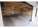 Attached two-car garage with overhead door at 1050 S Monaco Pkwy # 88, Denver, CO 80224