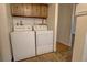 Laundry closet with side by side washer and dryer at 1050 S Monaco Pkwy # 88, Denver, CO 80224