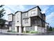Modern three-story townhome with attached garage at 11940 Soprano Trl, Lone Tree, CO 80134