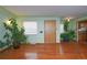 Spacious entryway with hardwood floors and built-in shelving at 2862 N Monroe St, Denver, CO 80205