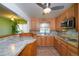 Bright kitchen with oak cabinets, granite countertops, and stainless steel appliances at 2862 N Monroe St, Denver, CO 80205
