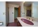 Bathroom with pink tile, a vanity, and shower at 2862 N Monroe St, Denver, CO 80205