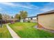 Large backyard with shed, patio, and fire pit at 2862 N Monroe St, Denver, CO 80205