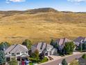 Aerial view of house and open space behind at 10364 Carriage Club Dr, Lone Tree, CO 80124