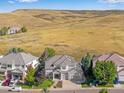 Aerial view of house and surrounding neighborhood at 10364 Carriage Club Dr, Lone Tree, CO 80124