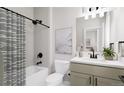 Guest bathroom with a tub, shower, and modern vanity at 1736 W 166Th Ave, Broomfield, CO 80023