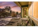 Cozy patio with seating area, perfect for enjoying the outdoors at 7323 S Kellerman Way, Aurora, CO 80016