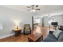 Open living space with hardwood floors at 1538 Oneida St, Denver, CO 80220