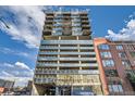 Modern high-rise building with glass and metal accents at 2020 Arapahoe St # 950, Denver, CO 80205