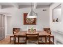 Bright dining room with wood table and chairs, ready for gatherings at 8060 E Girard Ave # 719, Denver, CO 80231