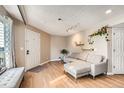 Living room features light hardwood floors and a gray sectional sofa at 5550 W 80Th Pl # 15, Arvada, CO 80003