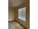 Simple bedroom with carpeted floor, window blinds and ceiling fan at 2043 S Salida St, Aurora, CO 80013
