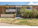 Condo building front view with walkway and landscaping at 5122 Williams Fork Trl # 201, Boulder, CO 80301
