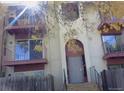 Building exterior featuring a multi-level structure with balconies and landscaping at 12172 Huron St # 207, Denver, CO 80234