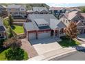 Nice two-story home with a three-car garage and landscaped yard at 1178 Freedom Way, Castle Rock, CO 80109