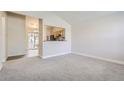 Open living area with a view into the kitchen at 1758 Eagle St # C, Aurora, CO 80011