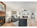 Living room features a fireplace and an open layout to the kitchen at 1100 S Waco St # G, Aurora, CO 80017