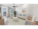 Living room with stylish furniture and hardwood floors at 20 Wilcox St # 216, Castle Rock, CO 80104