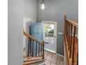 Wooden staircase leading to the upper floor at 6352 S Johnson St, Littleton, CO 80123