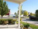 View of the home's front yard, showcasing a well-maintained lawn and neighborhood homes at 20768 Randolph Pl, Denver, CO 80249