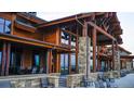 Rustic clubhouse exterior with stone and wood details at 3180 Newfound Lake Rd, Berthoud, CO 80513