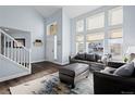 Spacious living room with ample natural light and comfy seating at 22333 Quail Run Way, Parker, CO 80138