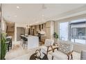 Modern kitchen with island, stainless steel appliances, and breakfast bar at 2313 S High St, Denver, CO 80210