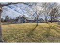 Ranch style home with spacious yard and mature trees at 7000 S Sheridan Blvd, Littleton, CO 80128