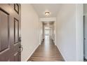 Bright and spacious entryway with wood-look flooring at 4316 Canyata Dr, Elizabeth, CO 80107