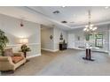 Bright and spacious condo lobby with comfortable seating area at 7931 W 55Th Ave # 112, Arvada, CO 80002