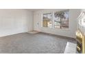 Living room with fireplace and view of front door at 16812 E Mansfield Cir, Aurora, CO 80013