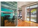 Bright office space with large windows and glass partition at 1401 Wewatta St # 101, Denver, CO 80202