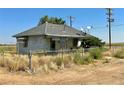 Small ranch home needing some TLC at 14176 County Road 8, Fort Lupton, CO 80621