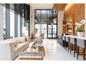 Elegant lobby with seating area and modern finishes at 155 Steele St # 316, Denver, CO 80206