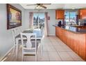 Bright dining area with a table and chairs next to the kitchen at 18971 E Mercer Dr, Aurora, CO 80013