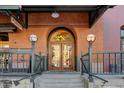 Main entrance to the building with brick facade and metal accents at 1792 Wynkoop St # 502, Denver, CO 80202