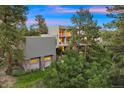 Modern home with attached garage and landscaping at 7 Elk Pointe Ln, Castle Rock, CO 80108